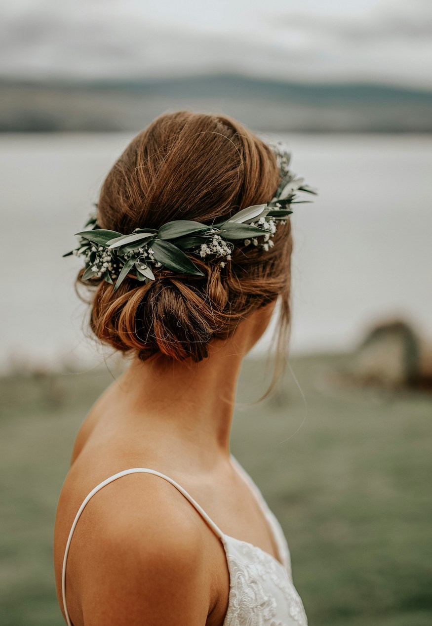 ### 27. Low Textured Bun With Greenery Crown
