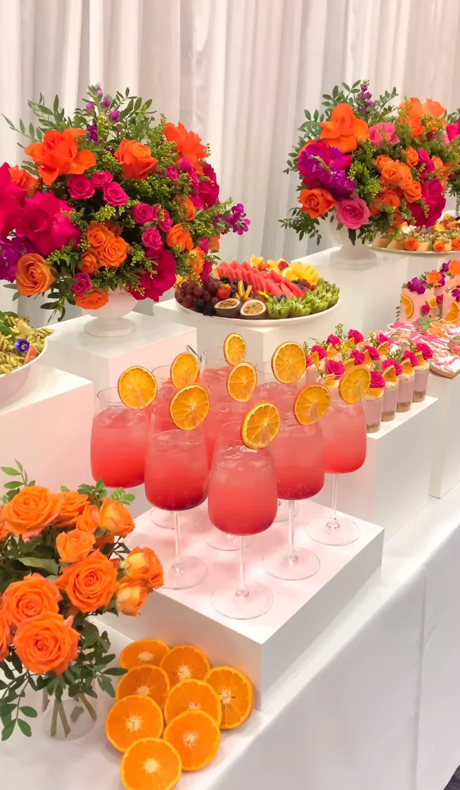 ### 11. Citrus Pink Wedding Dessert Bar Arrangement
